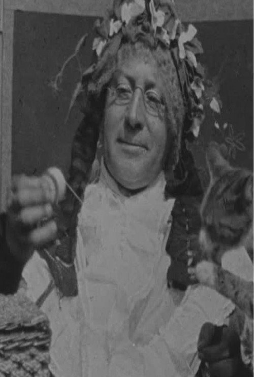 Grandma Threading Her Needle Poster